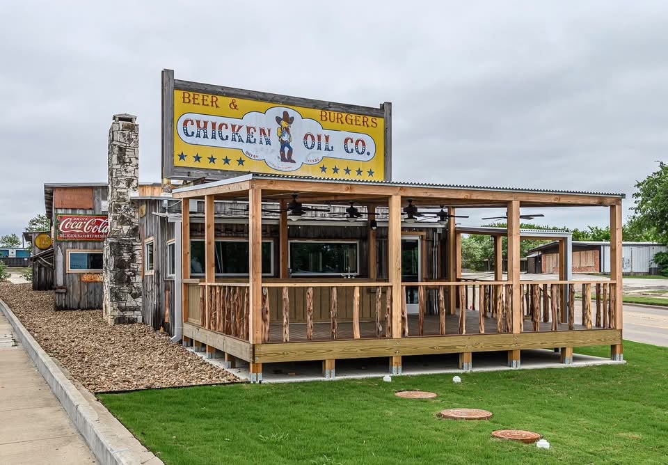 The newly-rebuilt exterior of the Chicken Oil Co includes a brand new porch.