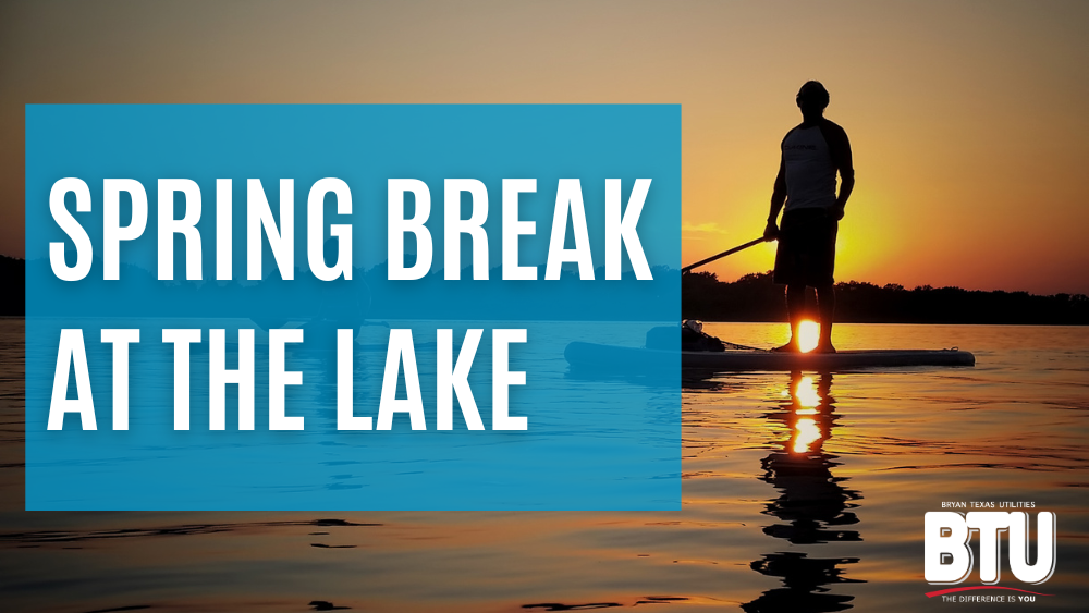 Spring Break at the Lake, a paddle boarder at lake Bryan during sunset