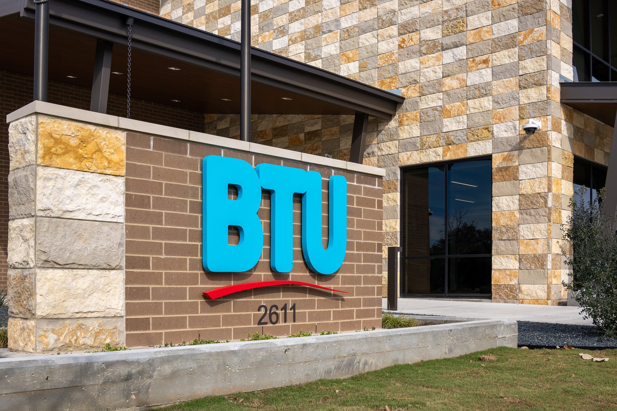 Sign with BTU logo in front of the BTU administration building